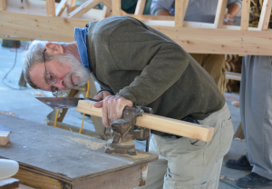 Burney building a wooden boat